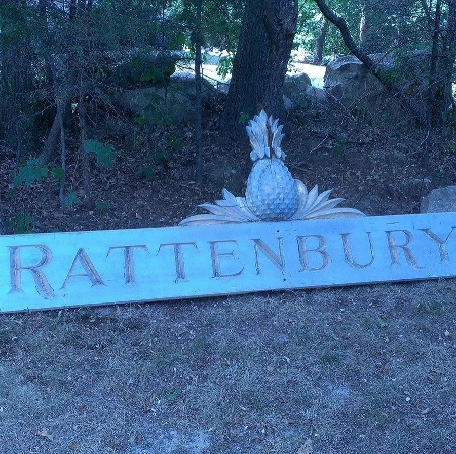 Hand-carved wooden Rattenbury sign